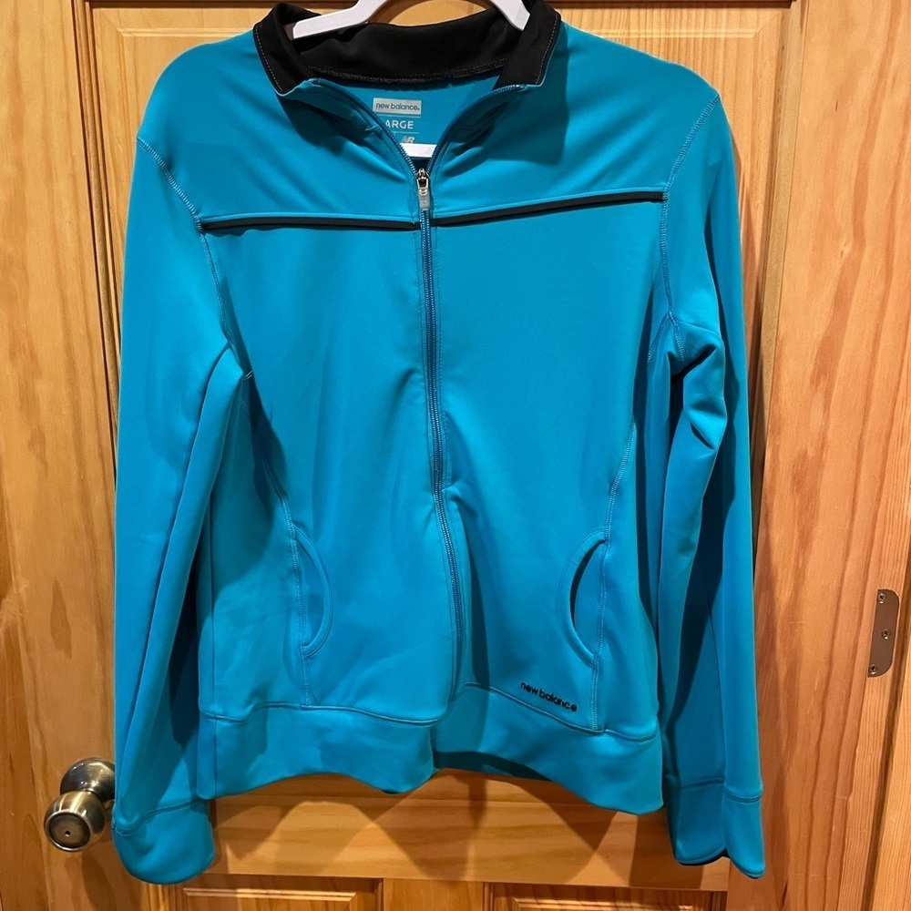 New Balance Women’s Lightning Dry Light Blue Athletic Jacket size Large used